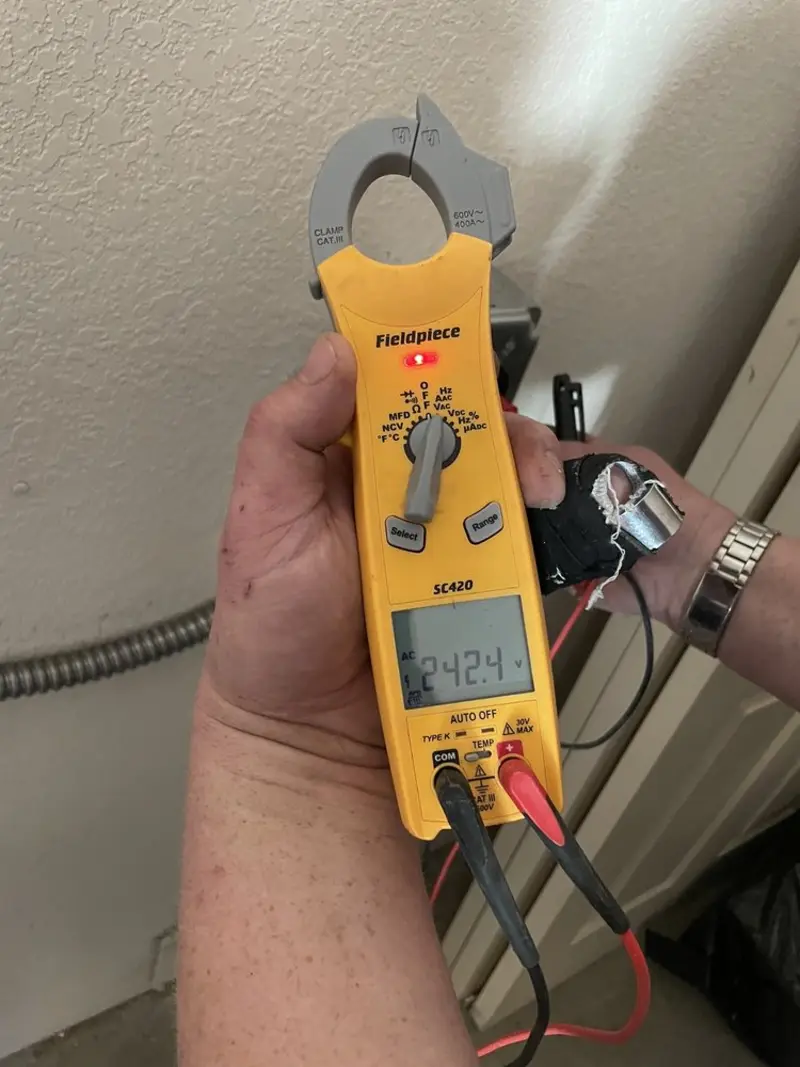 Voltage testing with clamp meter during Generator Installation in Brielle